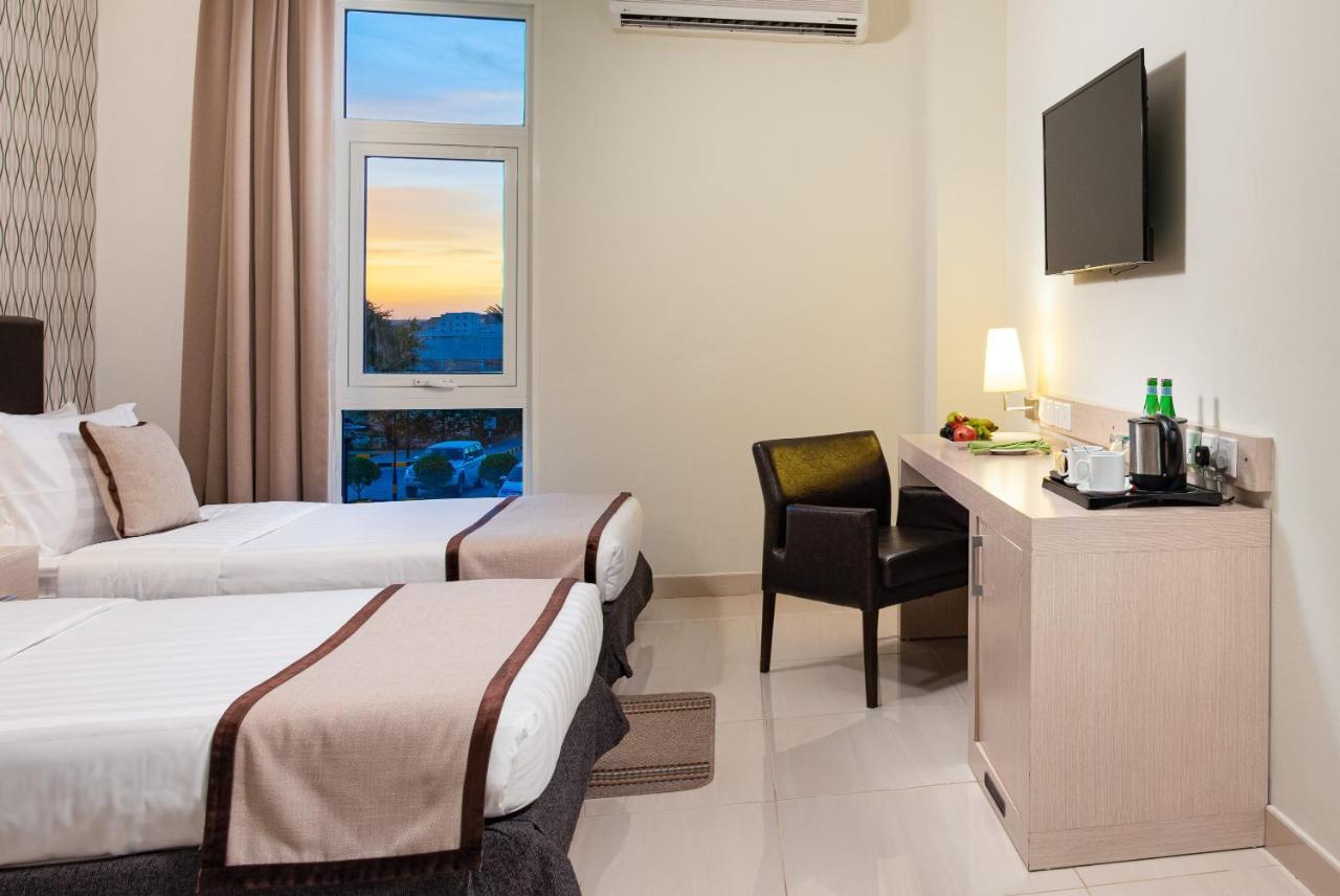 City Hotel Дукм Екстериор снимка