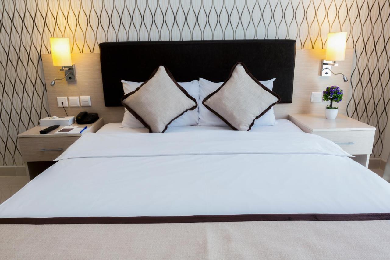 City Hotel Дукм Екстериор снимка
